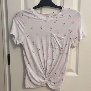 white t-shirt with cute cherry pattern